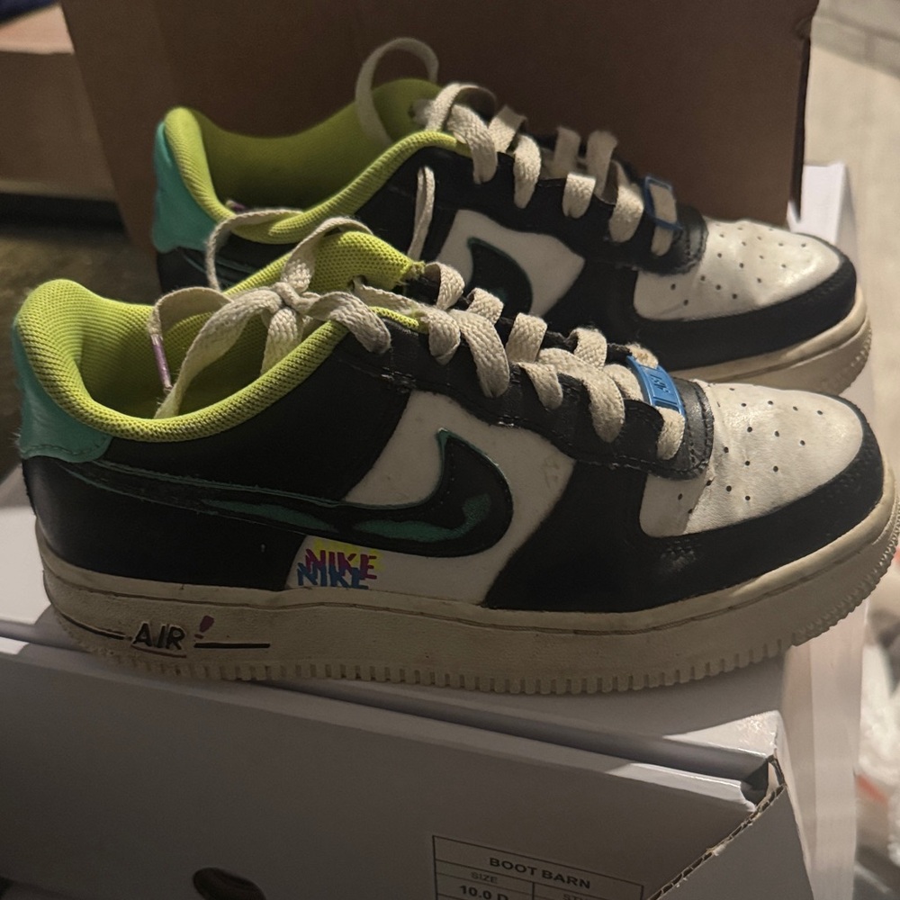 Nike Kids Black and White Dunk Sneakers with Green Accents
